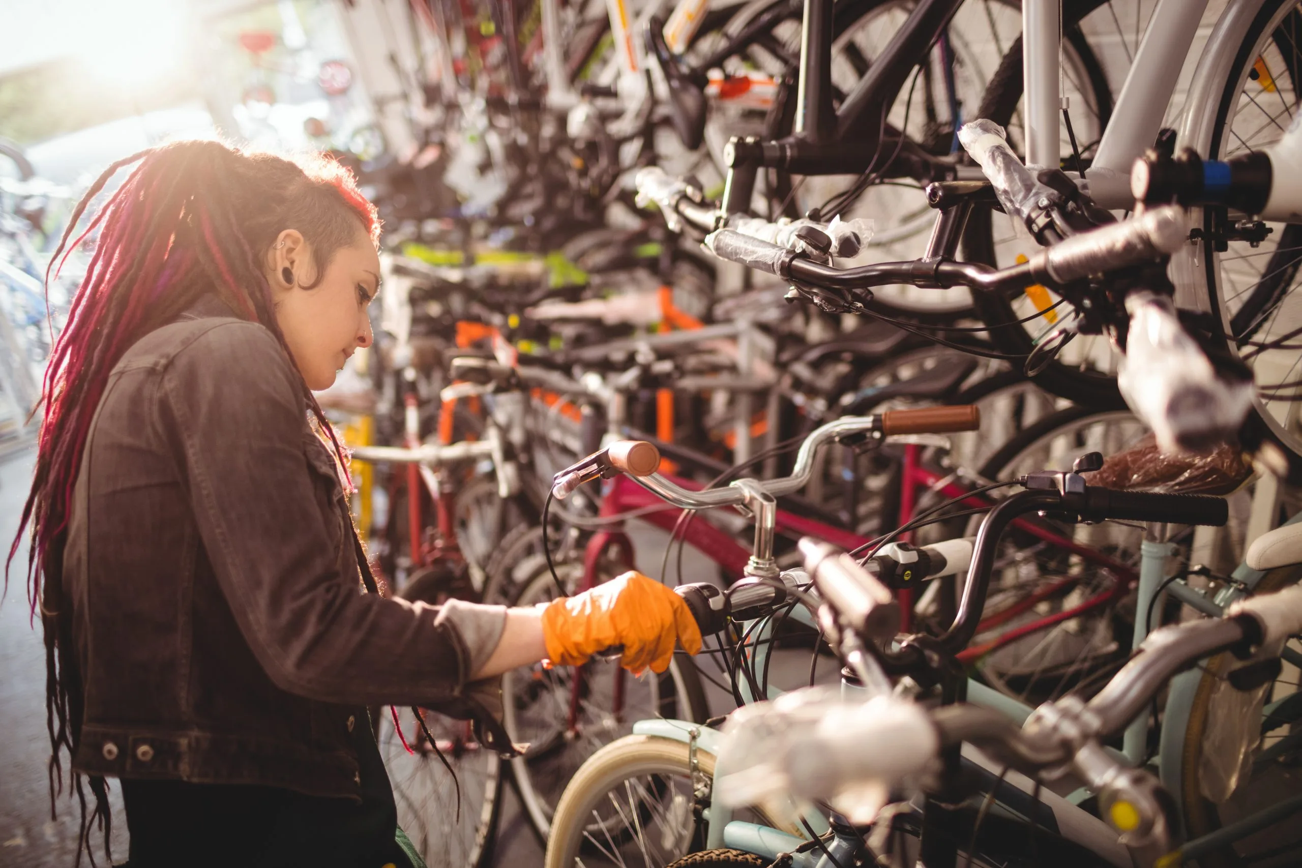 India Bicycle Market Growth Fueled by Electric Mobility as E-Bike Market Expands at 9.89% CAGR value mechanic-examining-bicycles-scaled