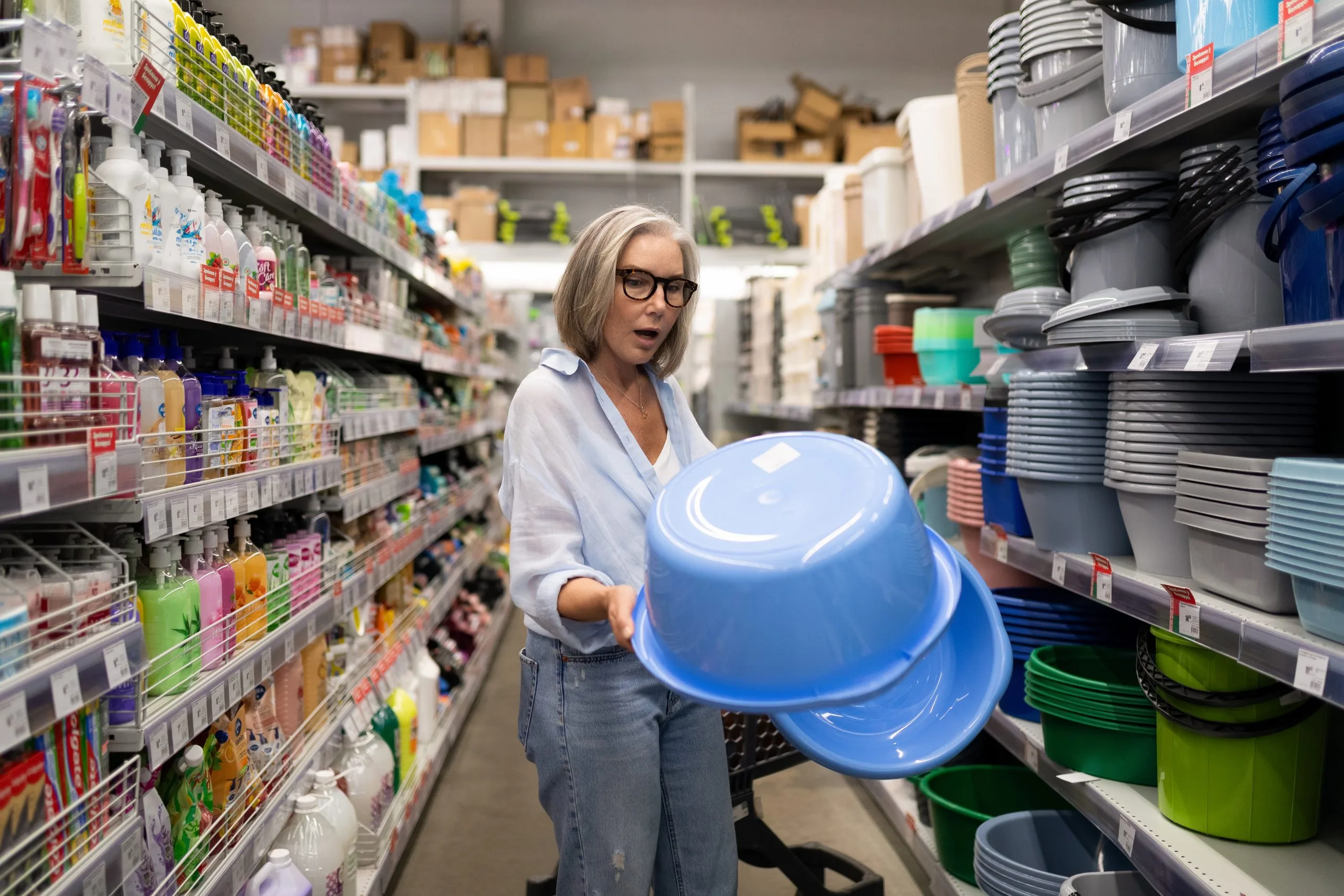 USA Household Cleaning Products Market Outlook Driven by USD 106.17 Billion Opportunity and Product Innovation modern-commercial-photo-shoot-home-improvement-store-featuring-middleaged-woman-exploring-various-departments-scaled