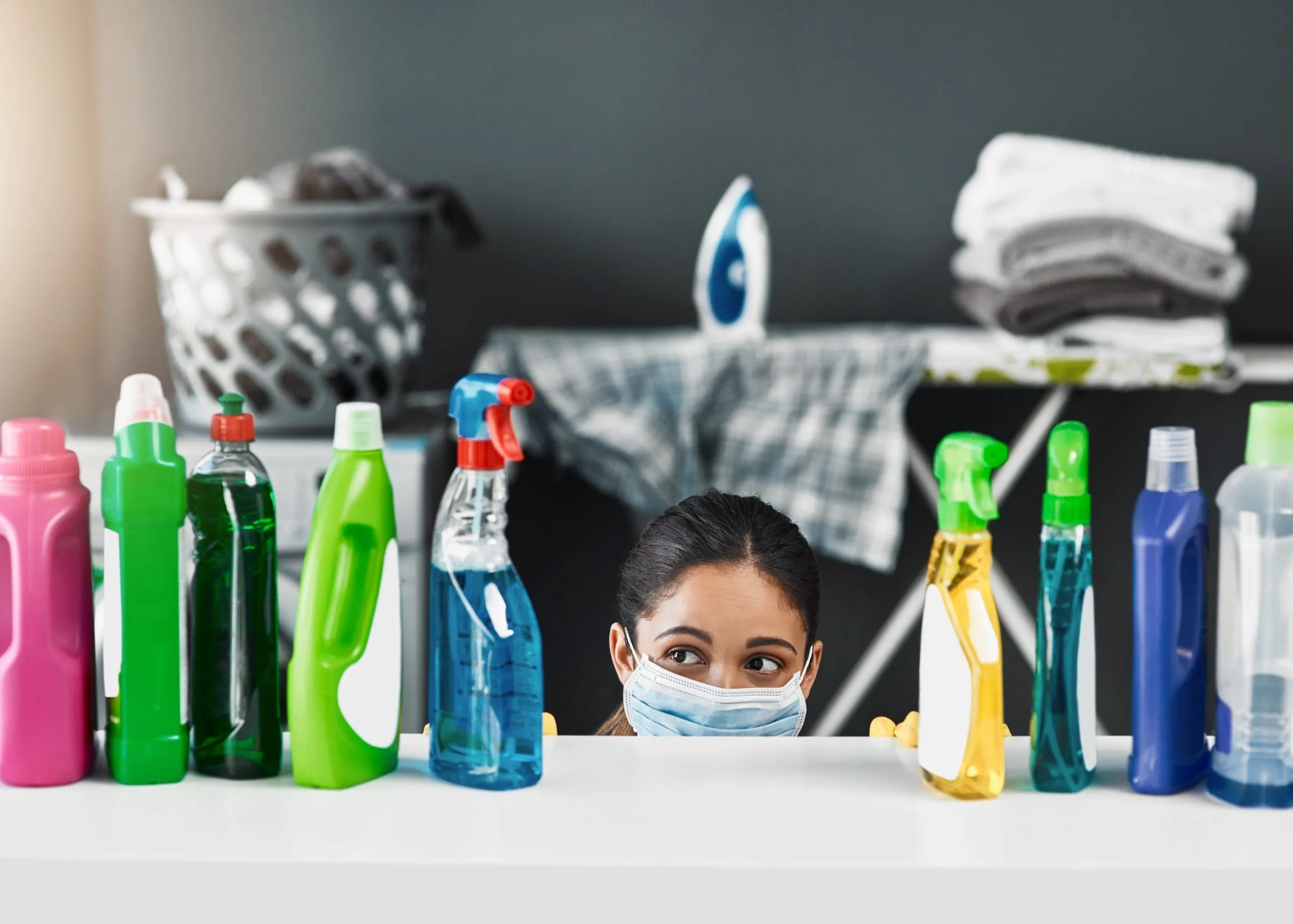 India Household Cleaners Market Trends Shaped by Surface Cleaners and USD 1.59 Billion Surface Care Demand thinking-woman-cleaning-product-spray-housekeeping-hygiene-chemical-liquid-chores-bottle-choice-detergent-housework-decision-with-mask-mpox-prevention-table-home-scaled