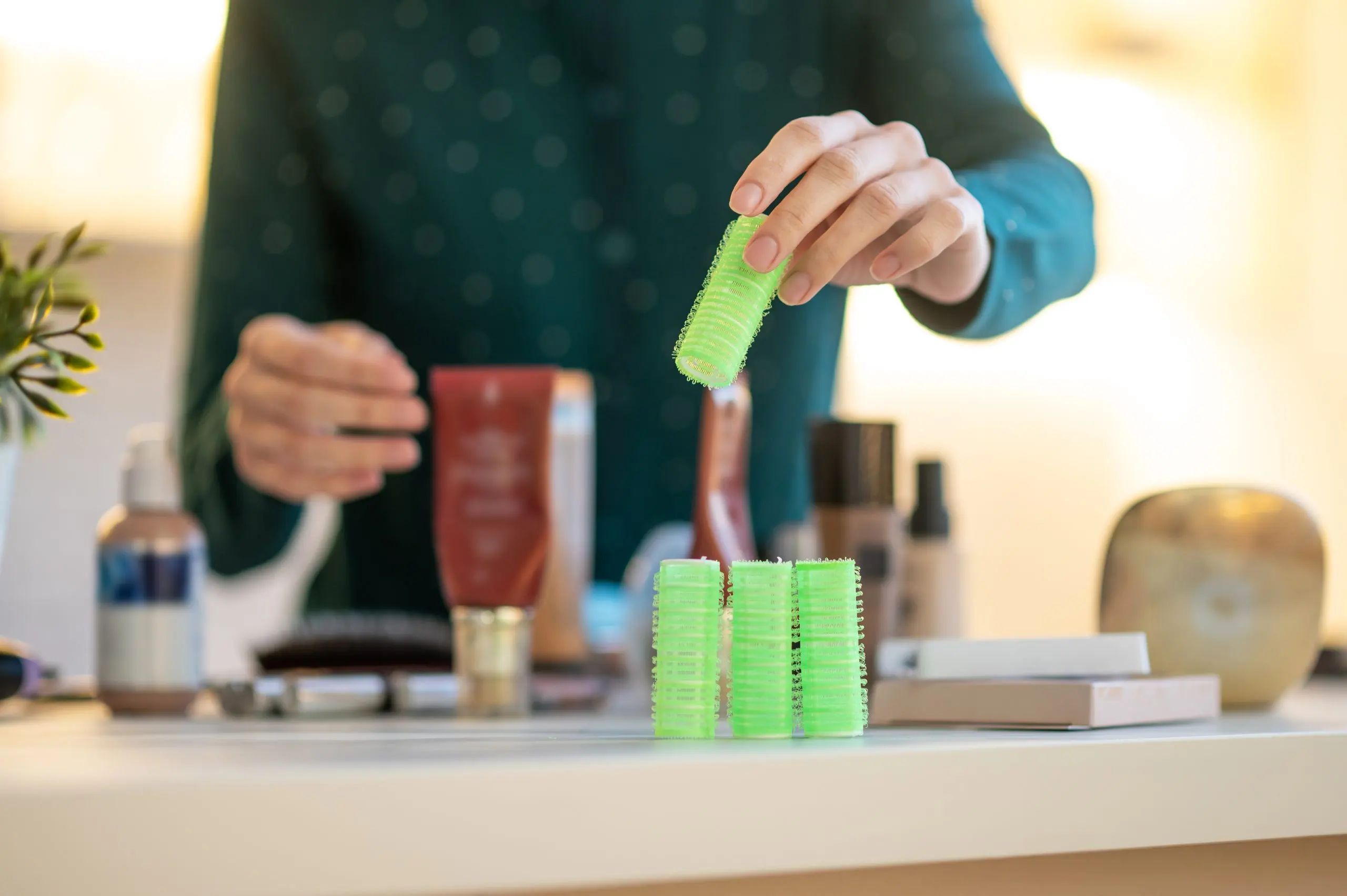 UAE Organic Personal Care Market Outlook Strengthens with USD 174 Million Revenue Potential woman-holding-green-curlers-hands-online-tutorial-hairstyling-scaled