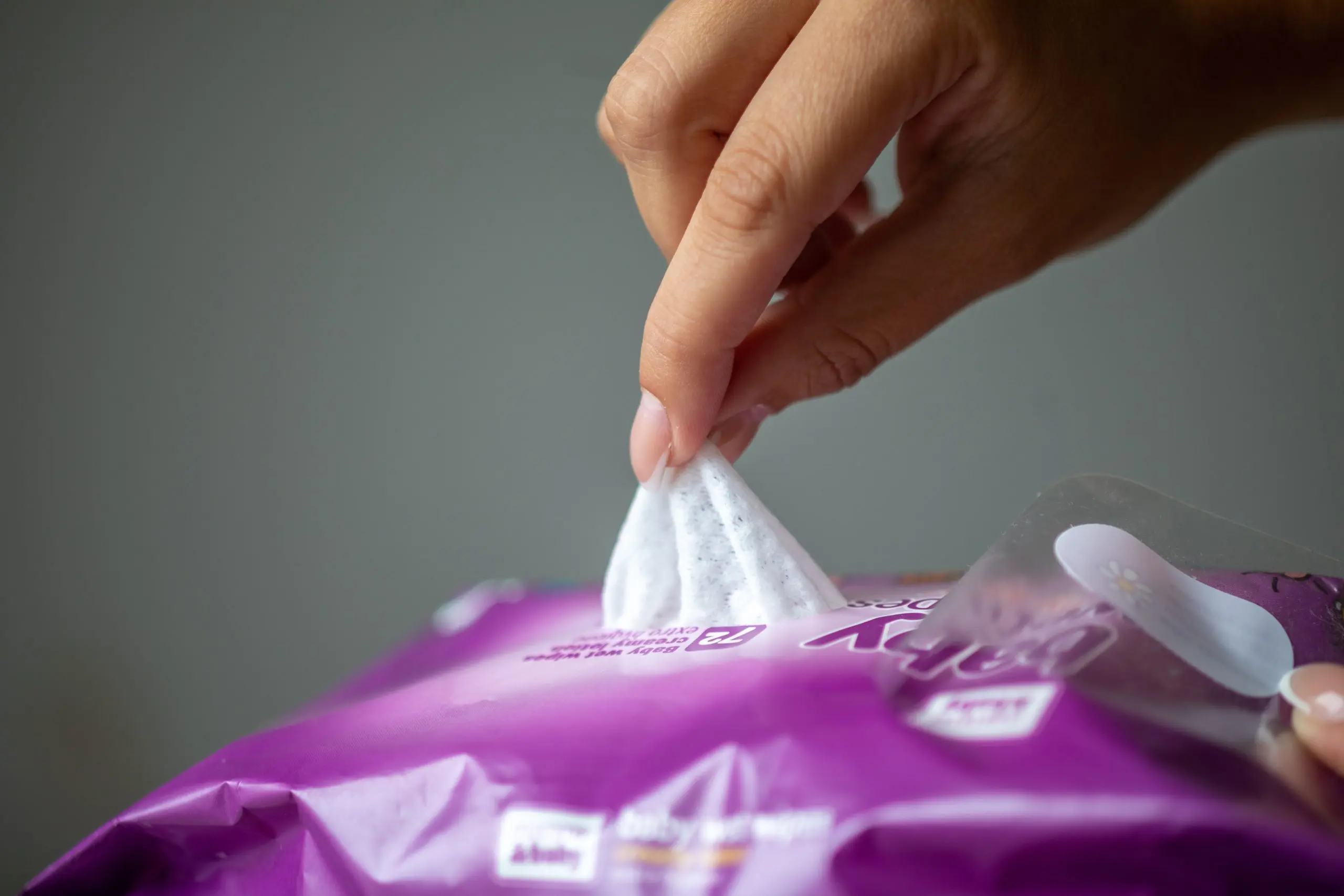 India Feminine Wipes Market Surpasses 400 Million Driven by Rising Hygiene Awareness young-woman-open-package-antibacterial-wet-wipes-cleaning-hands-1-scaled