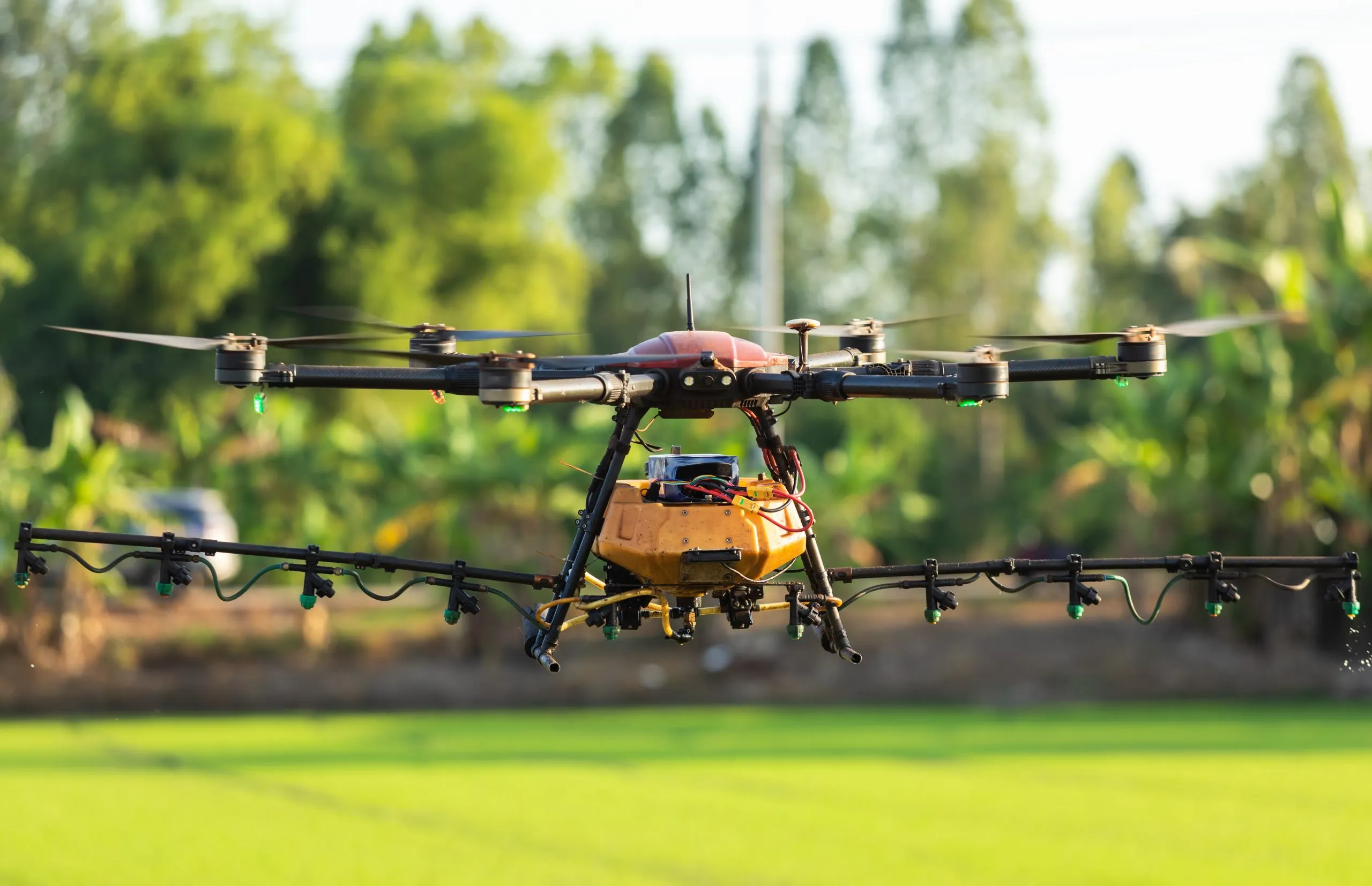 Brazil Agriculture Drones Market Strengthens as South America Agricultural Drones Grow at 13.78 Percent CAGR agriculture-drone-flying-rice-field-sprayed-chemical-fertilizer-technology-agriculture-concept-scaled