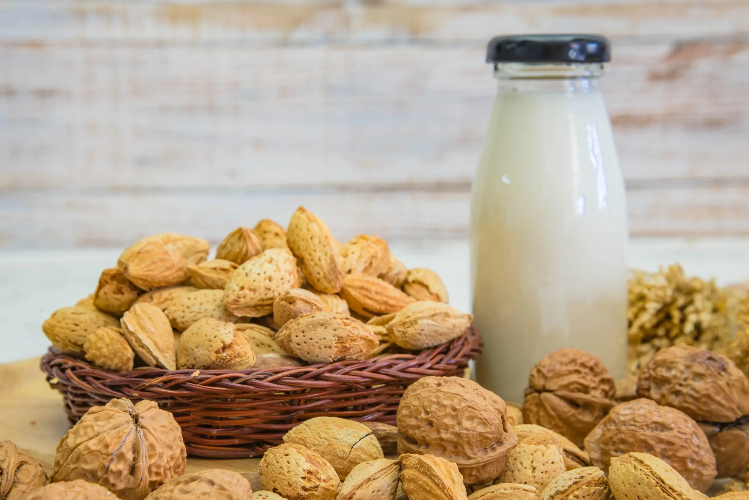 KSA Almond Milk Market Expected to Reach USD 980 Million Driven by Rising Plant-Based Beverage Demand arrangement-dried-fruits-almonds-walnuts-rustic-old-wooden-table-scaled