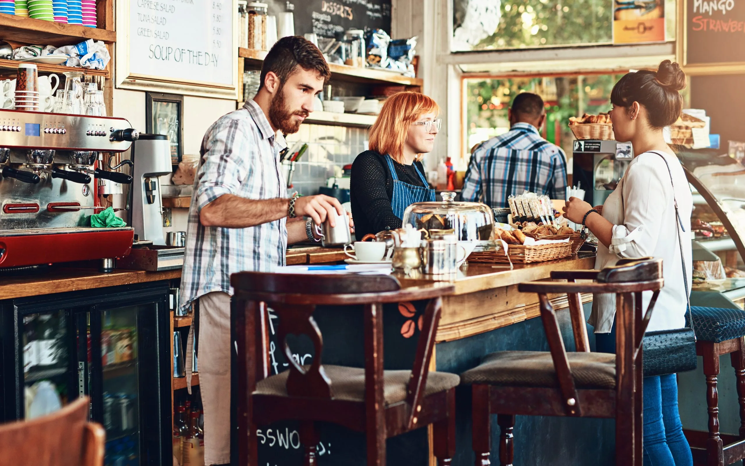 UK Cafes and Bars Market Expected to Reach USD 45.6 Billion Driven by Growing Coffee Culture barista-woman-cafe-as-waitress-small-business-with-customer-restaurant-coffee-shop-working-people-cafeteria-client-food-service-with-entrepreneur-startup-new-york-city-scaled