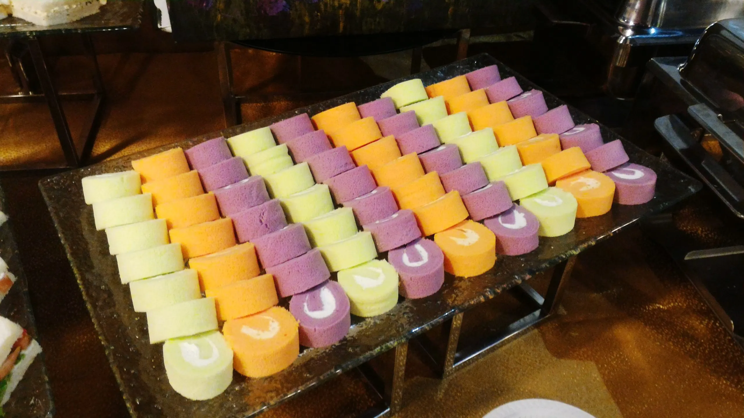 Singapore Dairy Desserts Market Supported by Dairy Consumption Exceeding 127 Million Kilograms high-angle-view-colorful-sweet-food-arranged-table-scaled