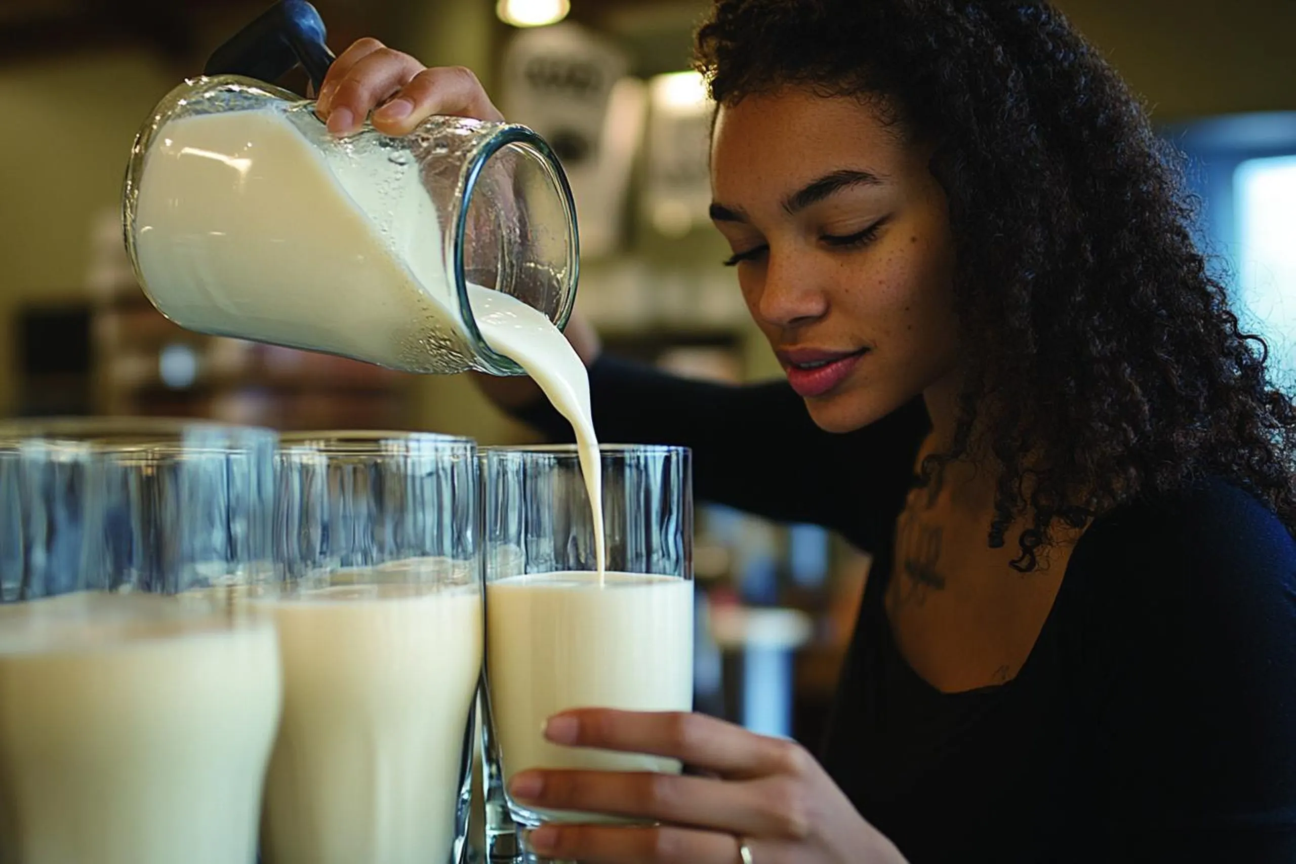 South Africa Reconstituted Milk Market Supported by a USD 4.87 Billion Industry and Strong Growth Potential person-pouring-cup-milk-into-glass-scaled