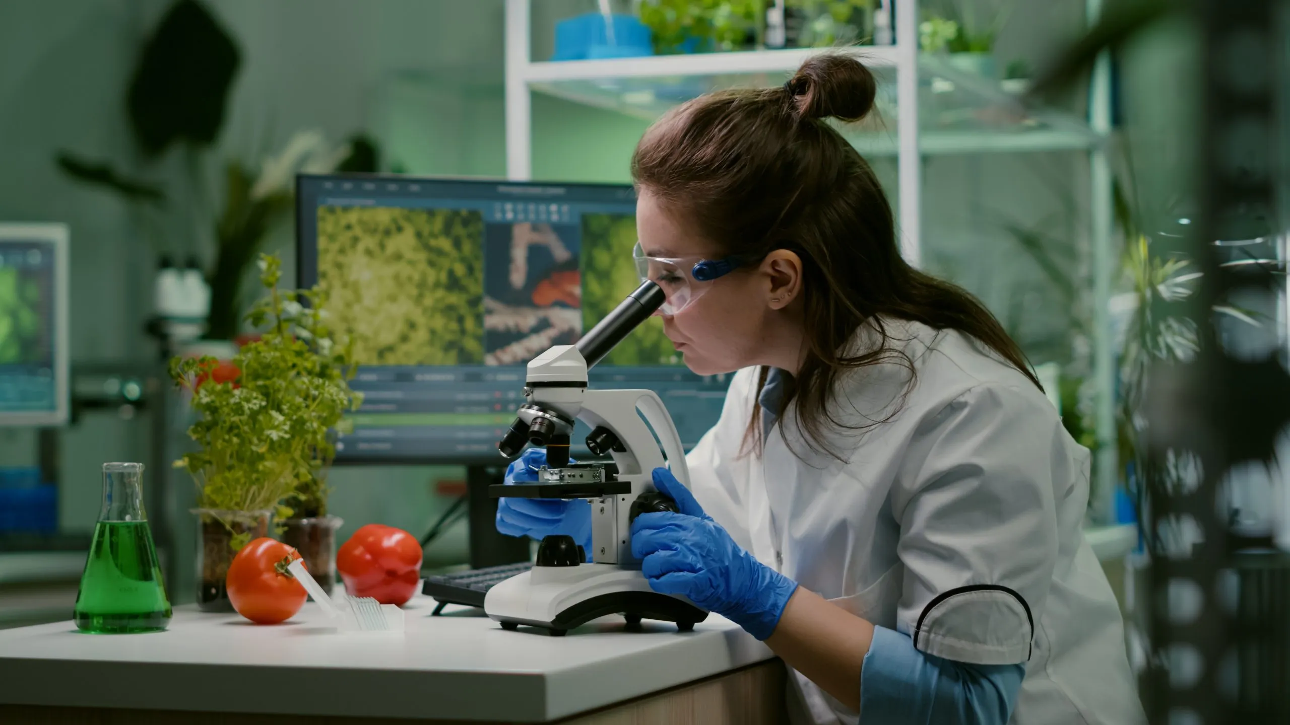 Singapore Microbial Food Culture Market Outlook to 2035 portrait-biologist-scientist-white-coat-working-expertise-laboratory-looking-into-microscope-analyzing-organic-gmo-leaf-scaled