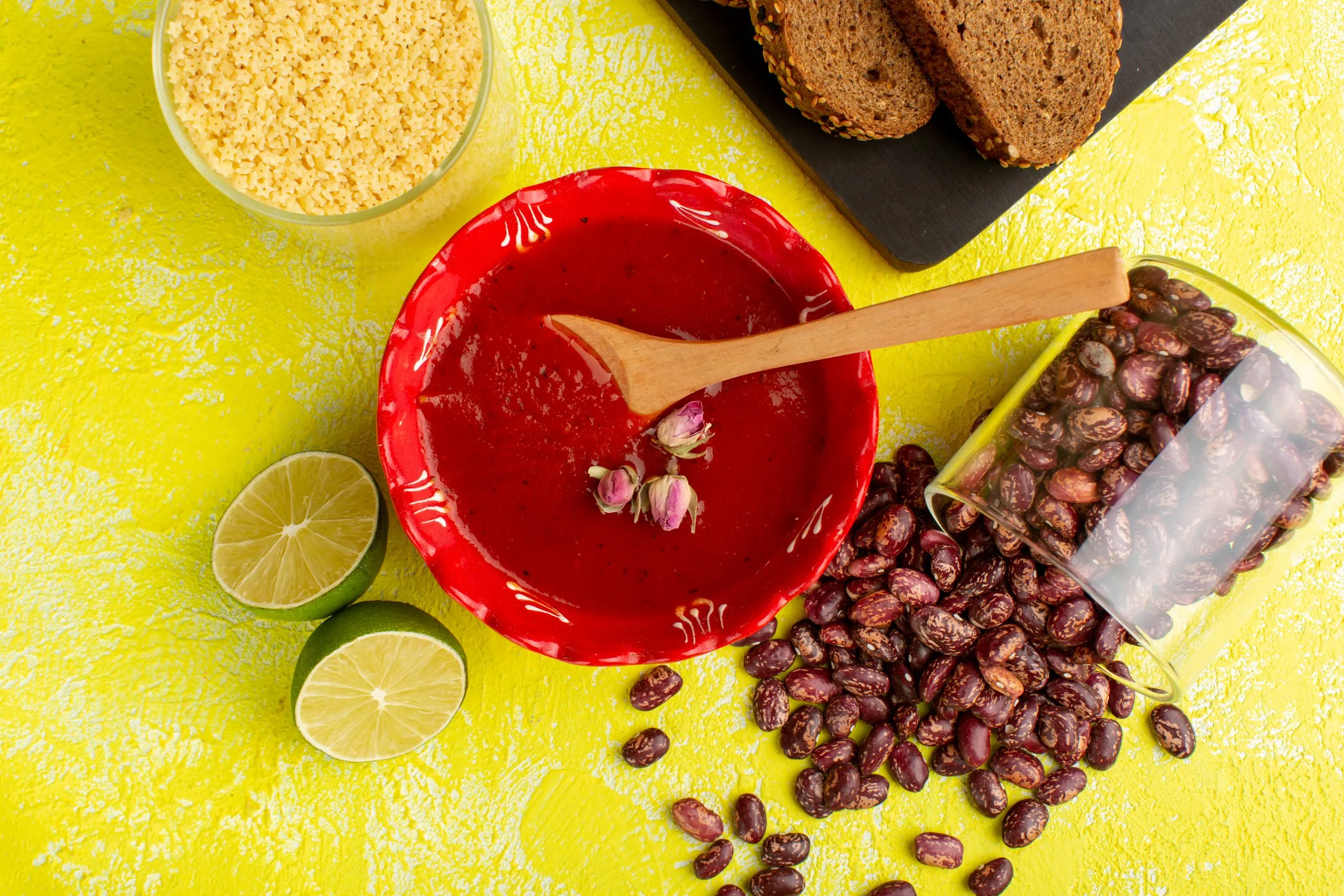 Brazil Food Emulsifiers Market Outlook to 2035 top-view-delicious-tomato-sauce-with-dark-bread-loafs-lemon-raw-beans-yellow-desk-soup-food-meal-dinner-scaled