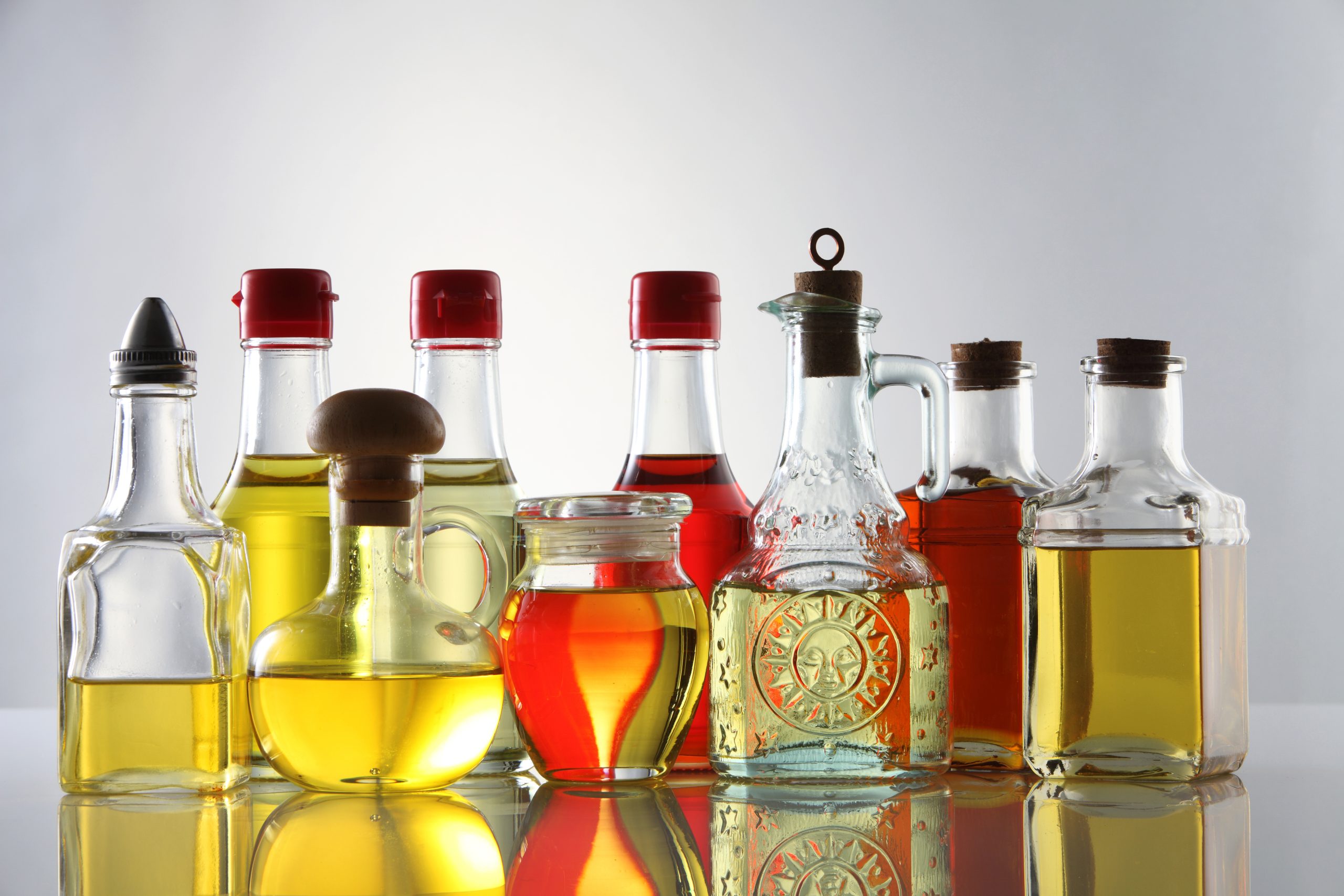 Indonesia Oleochemicals Market Outlook to 2035 palm-oil-sesame-seed-oil-olive-oil-grape-seed-oil-corn-oil-glass-bottle-white-scaled
