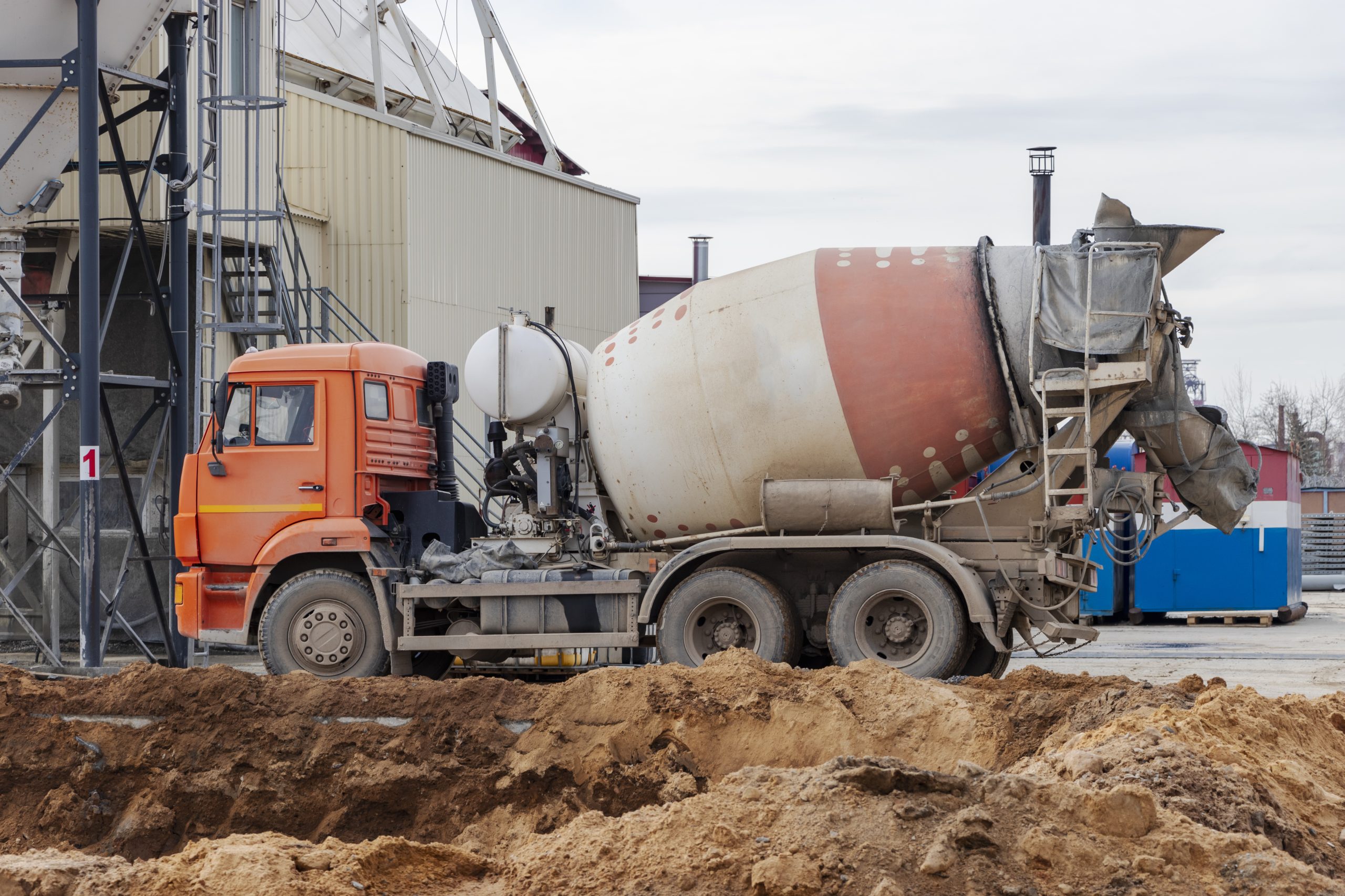Thailand Ready-Mix Concrete Market Outlook to 2035 concrete-mixer-truck-loads-concrete-factory-transportation-concrete-construction-site-construction-equipment-delivery-concrete-scaled