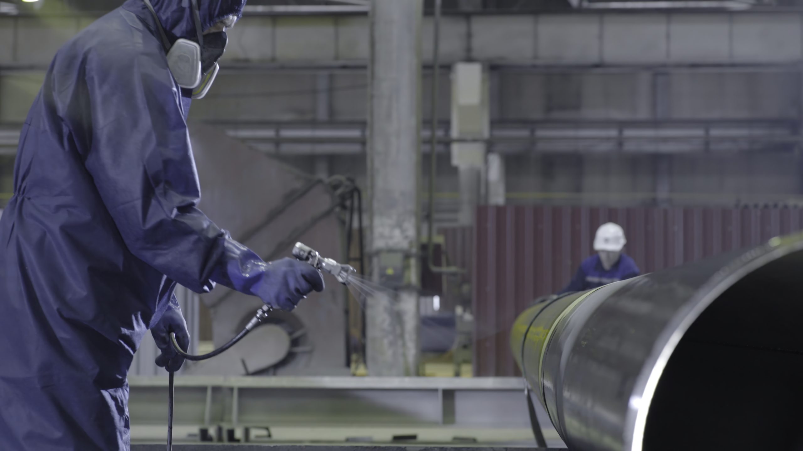 Vietnam Polyurethane Sealants Market Outlook to 2035 male-holding-spray-gun-painted-steel-man-paints-pipe-atomizer-scaled