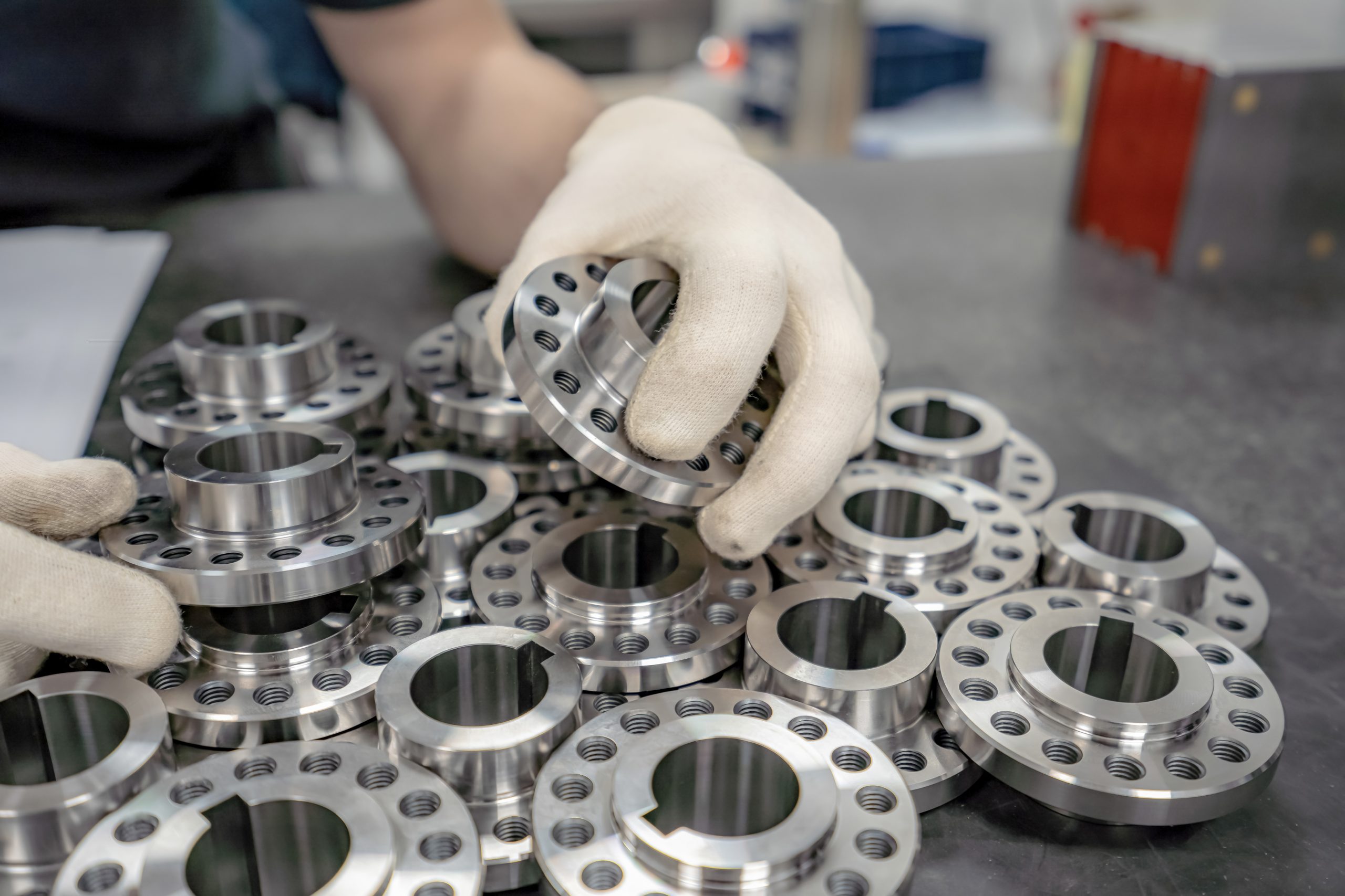 UK Gaskets and Seals Market Outlook to 2035 worker-inspects-sorts-round-parts-with-holes-assembling-them-into-components-assemblies-scaled