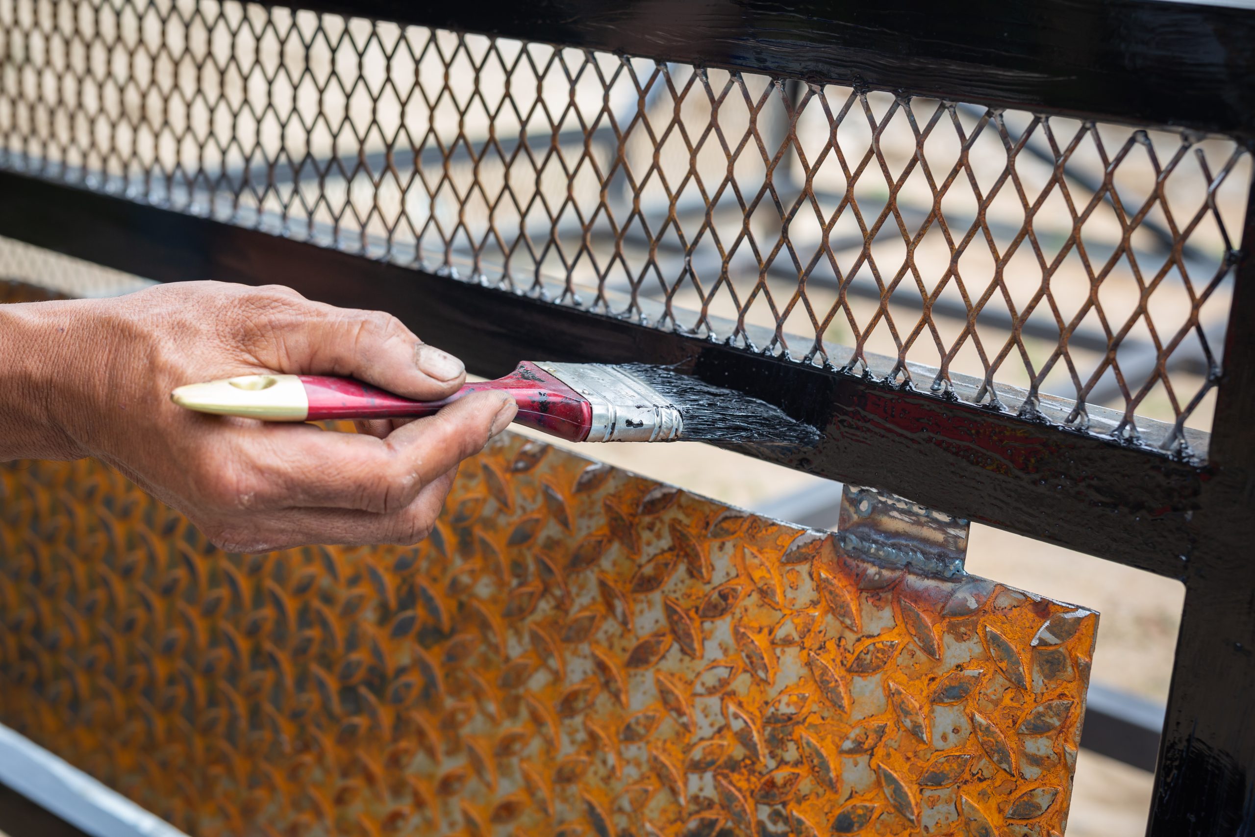 Vietnam Corrosion Inhibitor Market Develops as USD 4.5 Billion Chemical Sector Supports Demand workers-use-black-steel-paint-brushes-scaled
