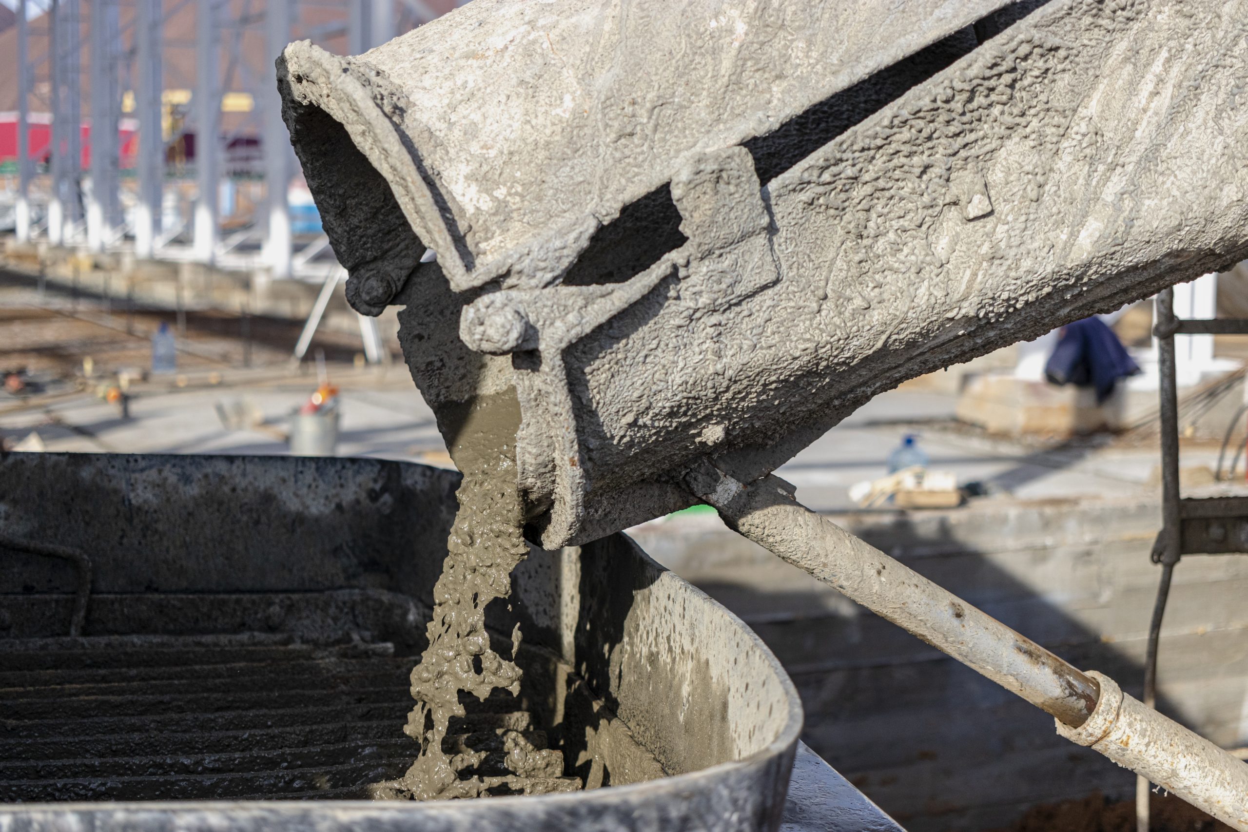Thailand Concrete Admixtures Market Outlook to 2035 concrete-mixer-truck-pours-concrete-into-pump-construction-site-scaled