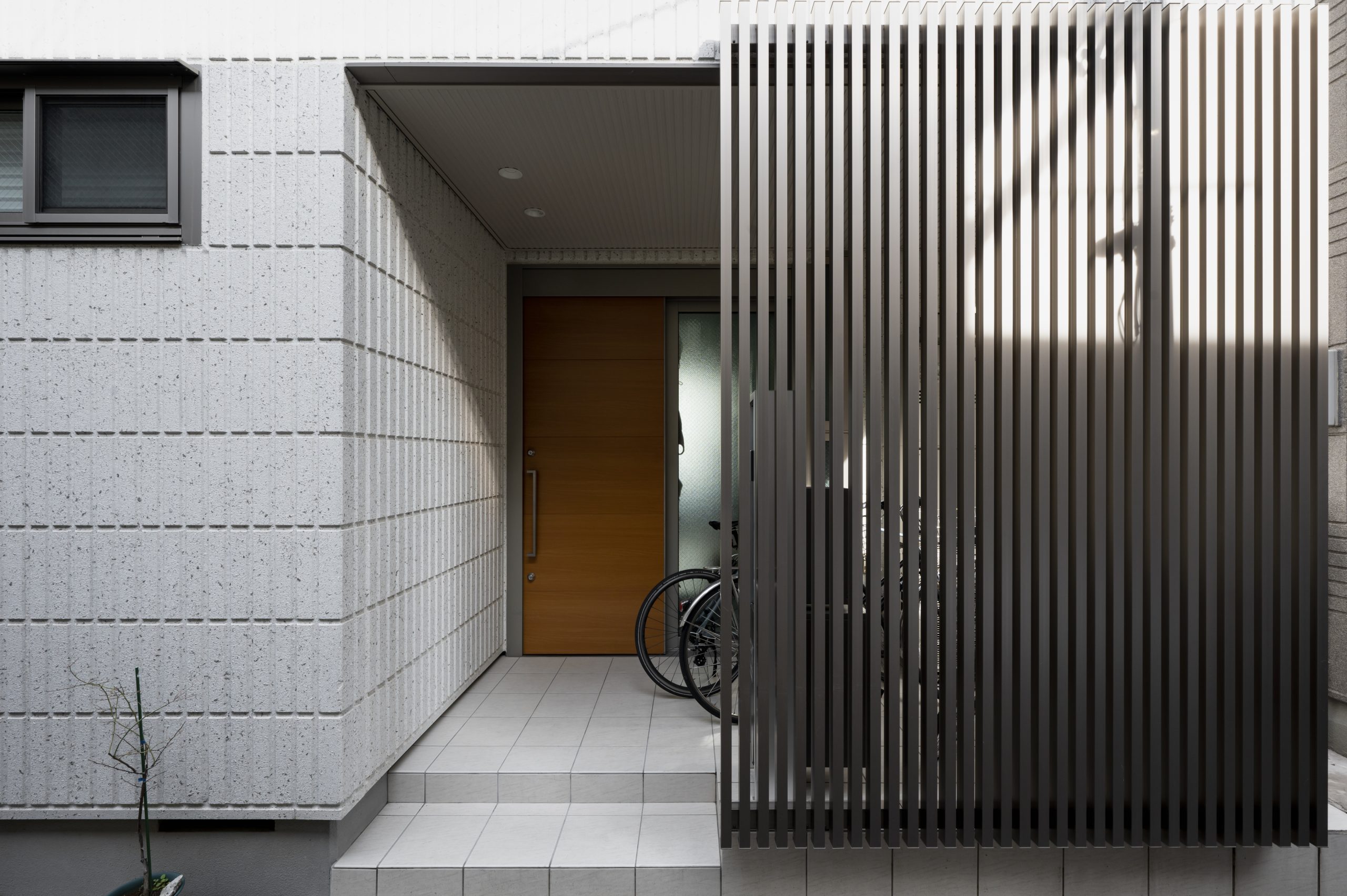 Italy Aluminum Composite Panels Market Outlook to 2035 house-entrance-japan-building-with-fence-scaled