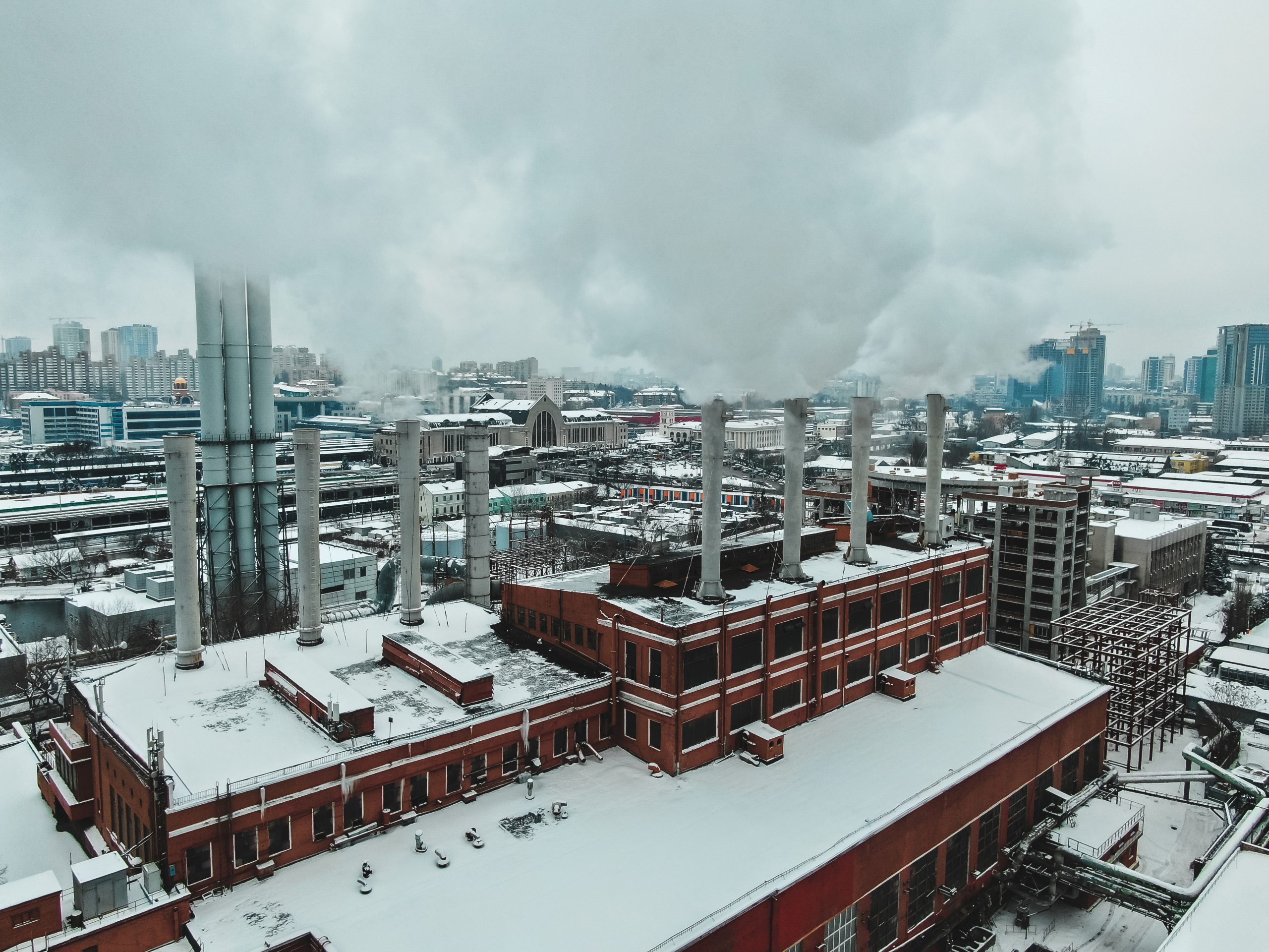 Canada Ambient and Industrial Air Quality Monitoring Systems Market Outlook to 2035 large-central-boiler-room-with-giant-pipes-which-there-is-dangerous-smoke-winter-frost-big-city-scaled