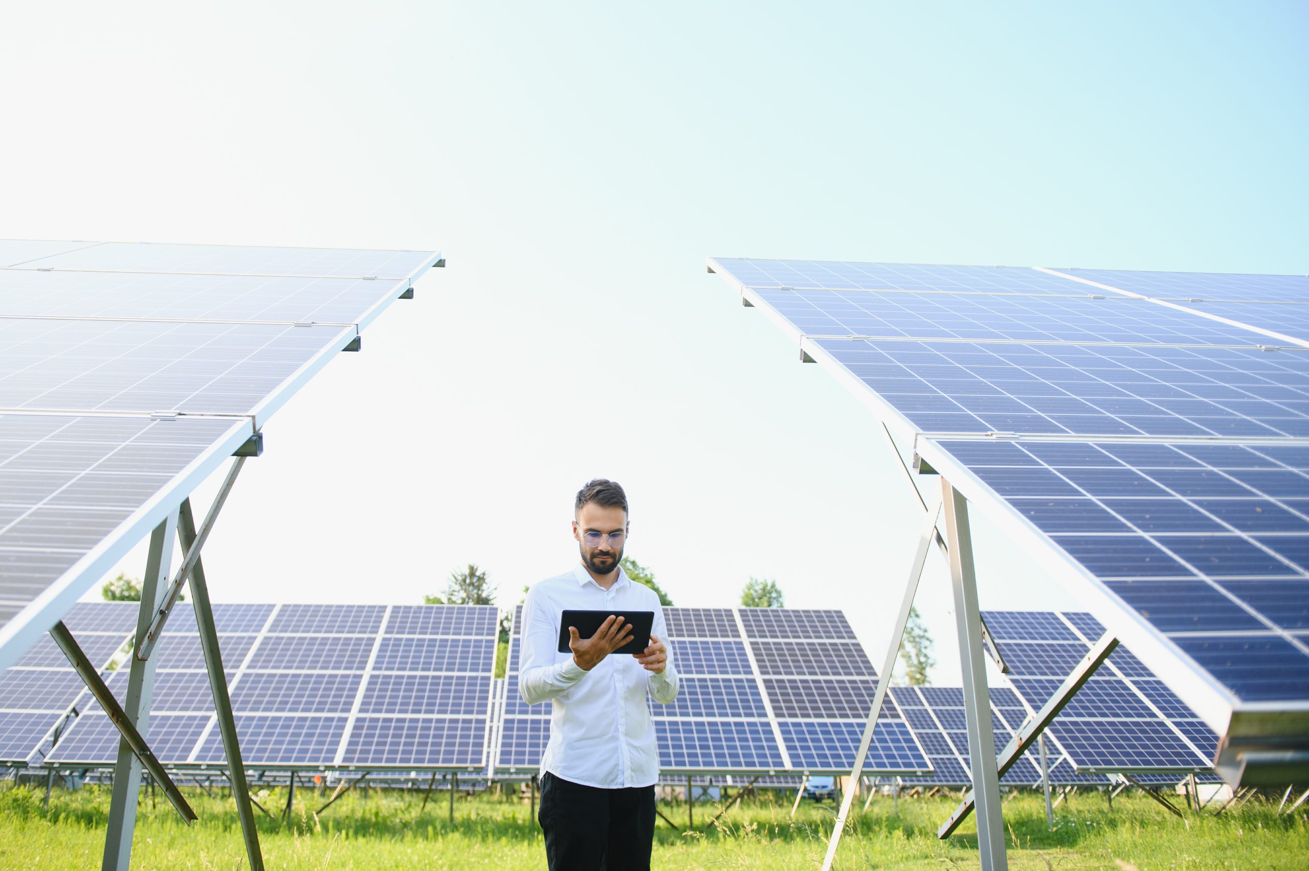 Germany Solar PV Wafers Market Outlook to 2035 male-worker-solar-power-plant-with-tablet-background-photovoltaic-panels-scaled