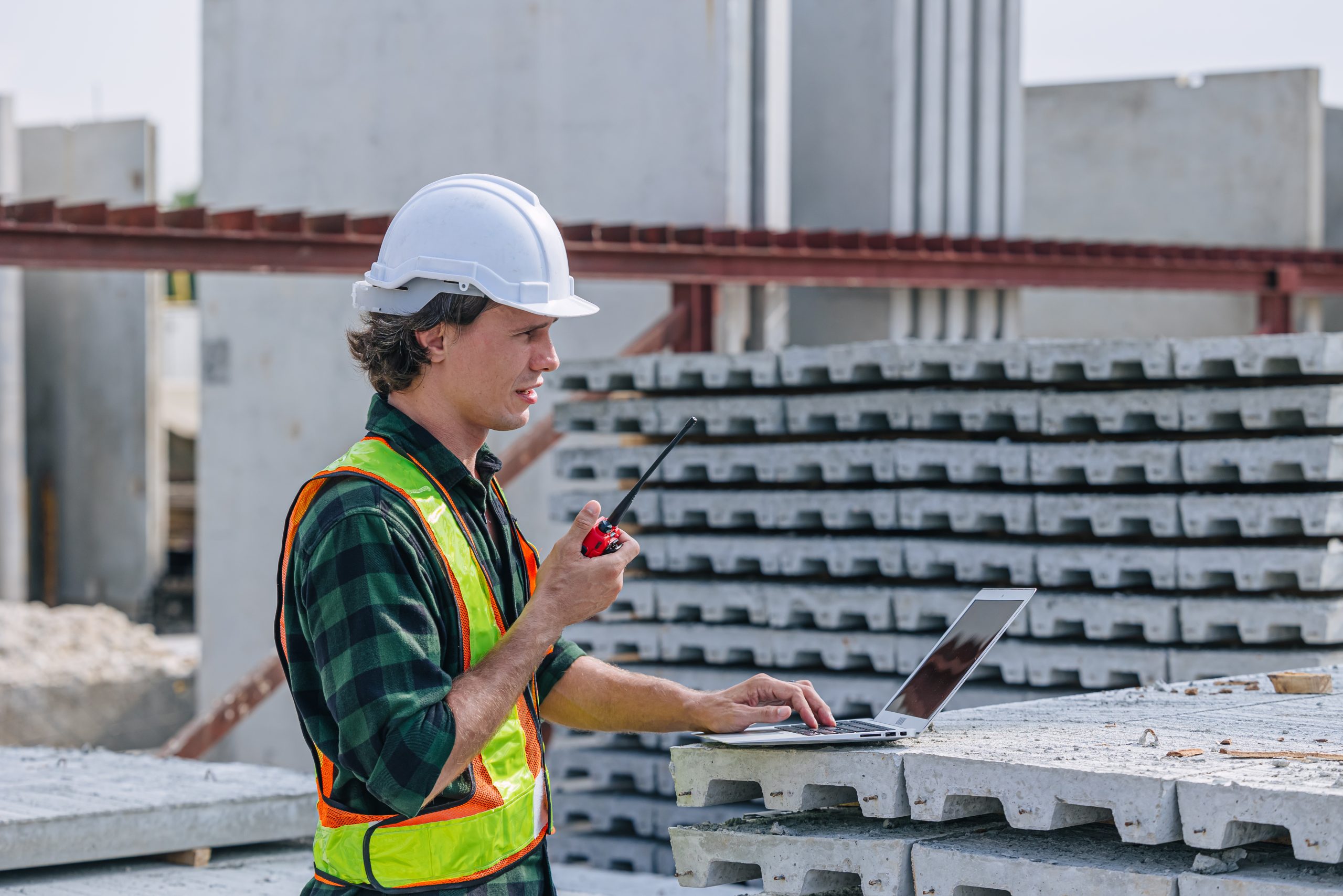 US Precast Concrete Market Outlook to 2035 professional-engineer-caucasian-male-working-concrete-precast-plant-factory-control-operate-construction-site-scaled