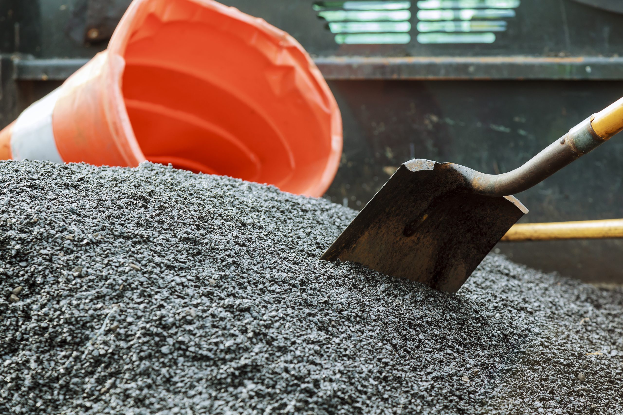 road-construction-new-asphalt-concrete-concrete-kerb-orange-safety-scaled
