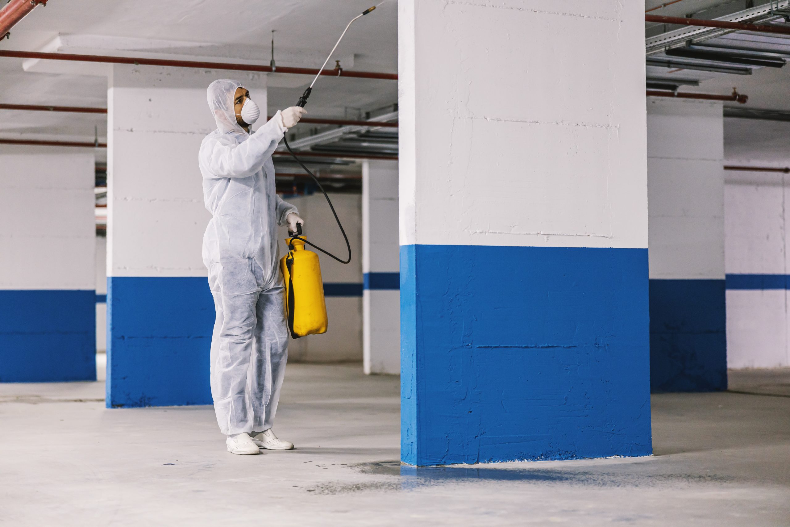 sanitizing-interior-surfaces-garage-cleaning-disinfection-inside-buildings-coronavirus-epidemic-professional-teams-disinfection-efforts-infection-prevention-control-epidemic-p-scaled